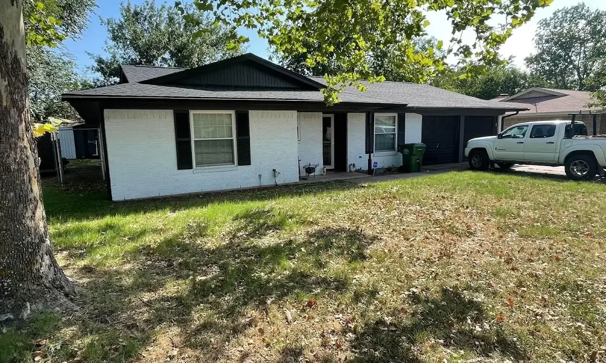 Professional roofing crew working on a residential roof in Nevada